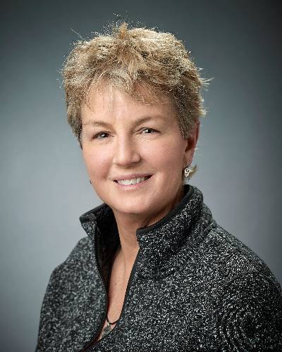 portrait photo of Kelly Hurston