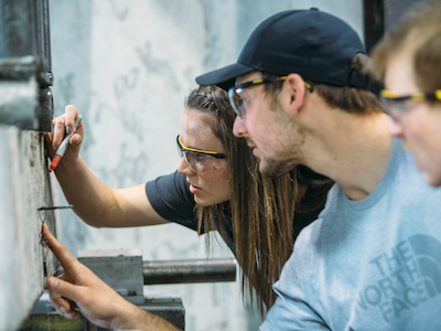 MSU students examining a concrete crack in the lab