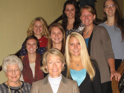 students and sponsors gathered on steps