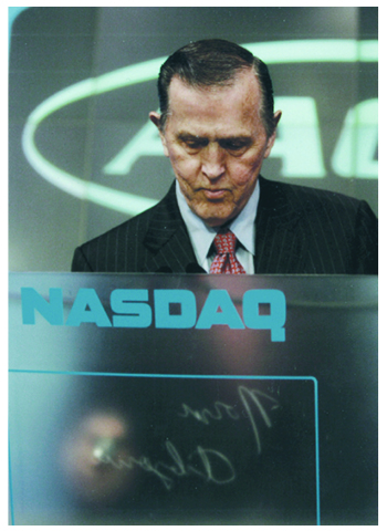 Norm got to ring the opening bell in 2013 on the Nasdaq stock exchange in New York, where AAON’s stock trades. Courtesy of AAON.
