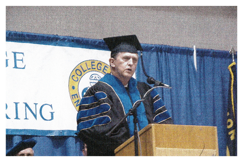 Norm accepts his honorary doctorate degree at Brick Breeden Fieldhouse in 2004.